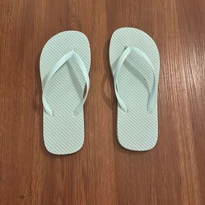 Hello! Im selling turquoise flip flops. They are brand new never worn !